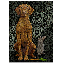 Load image into Gallery viewer, Vizsla seated with it’s paw on a carrot  and a rabbit showing some interest 
